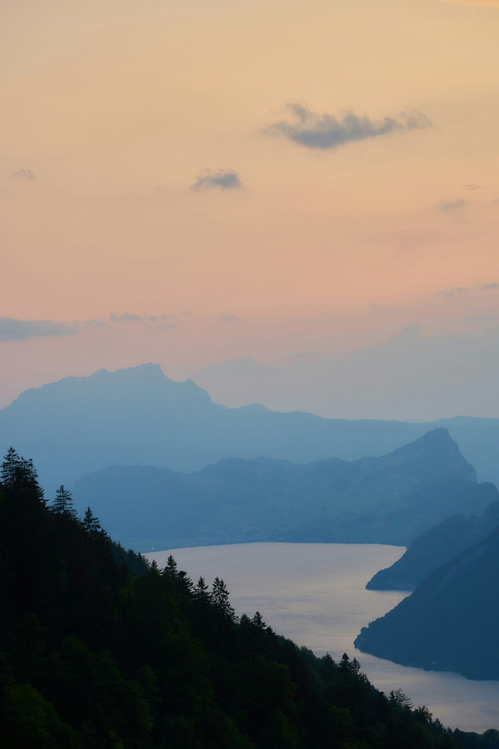 Mountain ridges under a pink evening sky