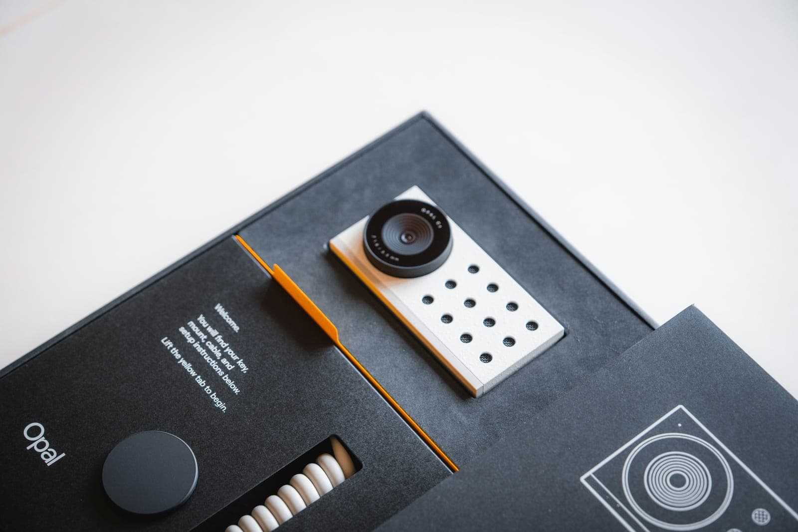 A camera device in its open black box